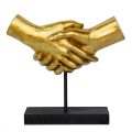 פסל אומנותי מוזהב "יד לוחצת יד"
